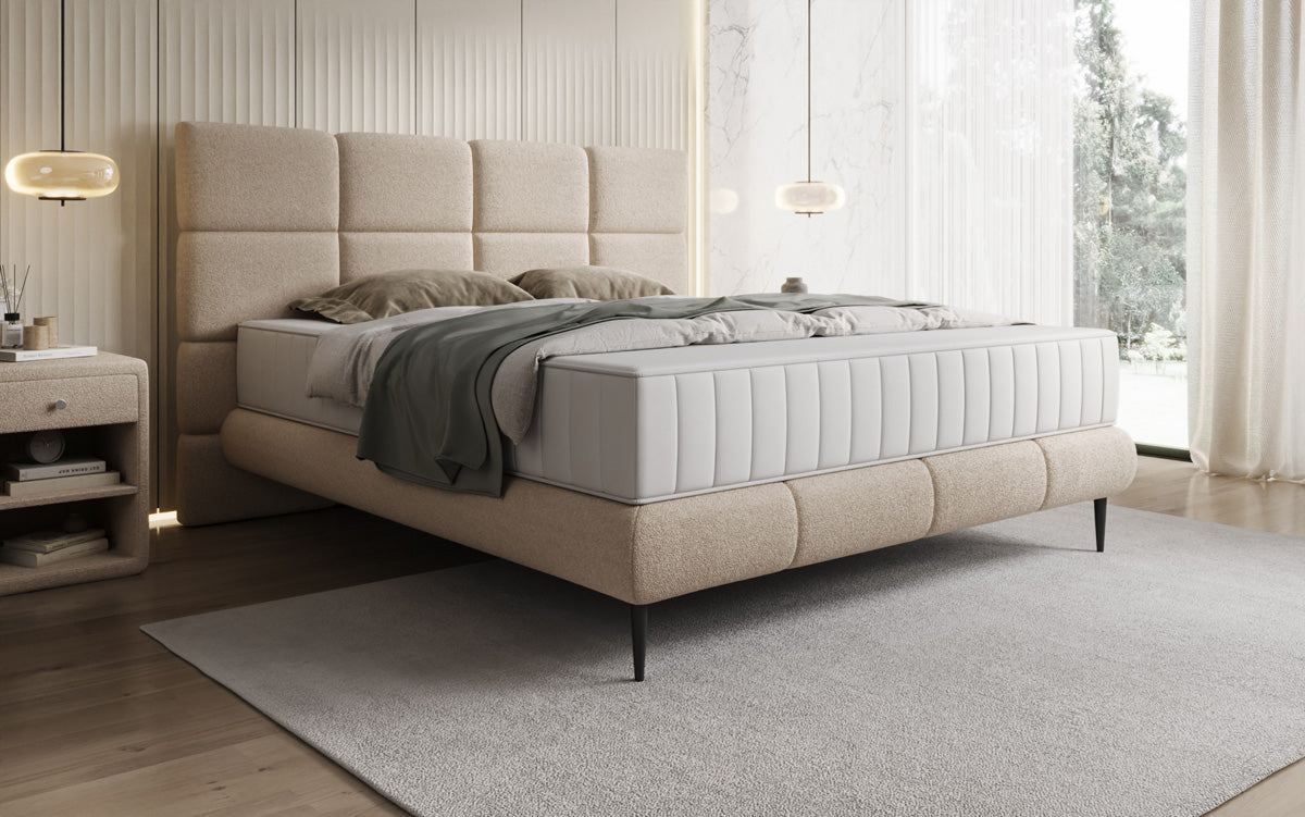 Nessa box spring bed with high legs in teddy bouclé