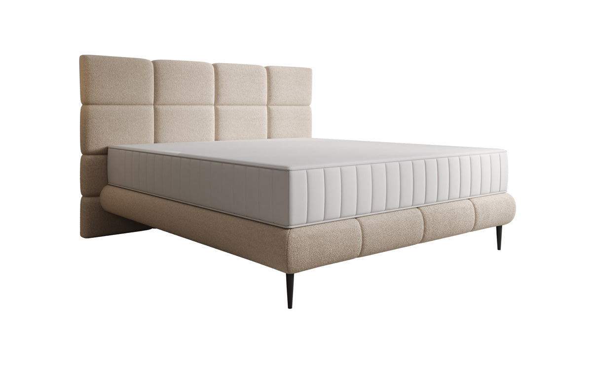 Nessa box spring bed with high legs in teddy bouclé