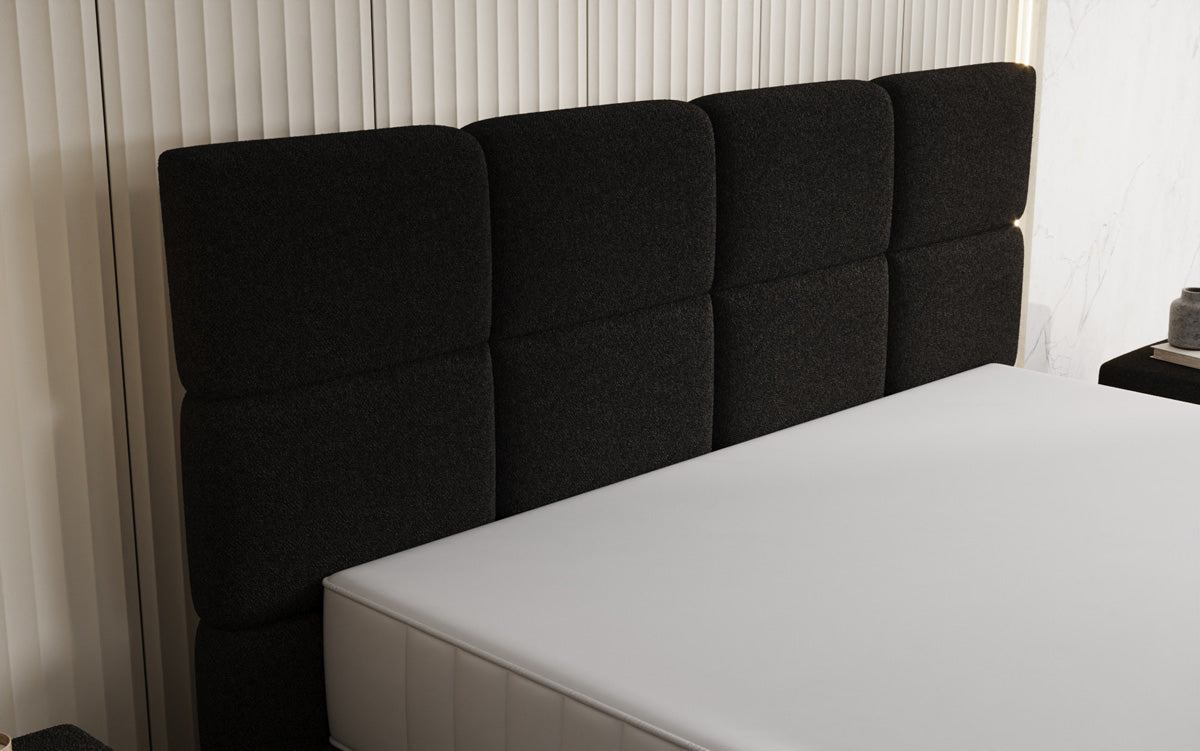 Nessa box spring bed with high legs in teddy bouclé