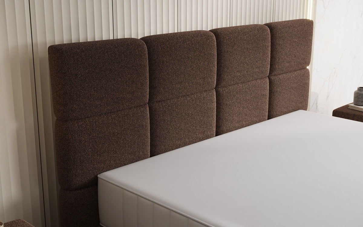 Nessa box spring bed with high legs in teddy bouclé