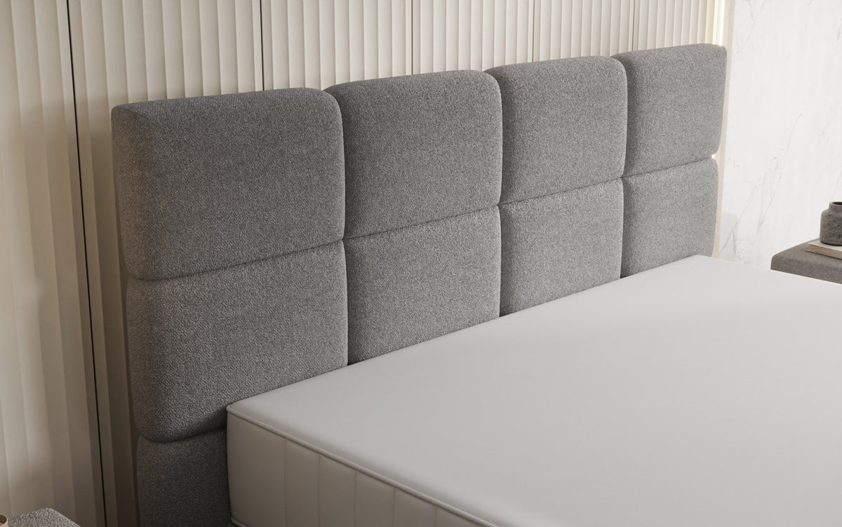 Nessa box spring bed with high legs in teddy bouclé