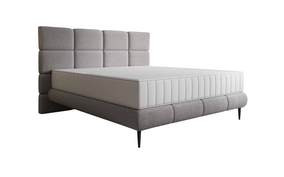 Nessa box spring bed with high legs in teddy bouclé