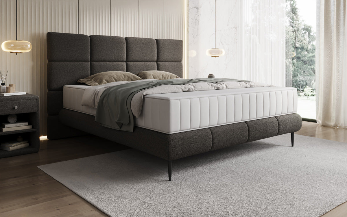 Nessa box spring bed with high legs in teddy bouclé