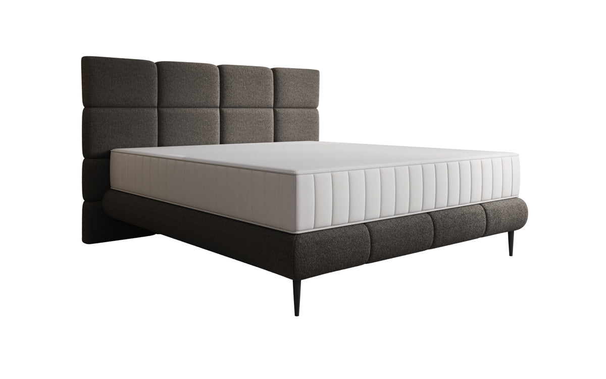 Nessa box spring bed with high legs in teddy bouclé