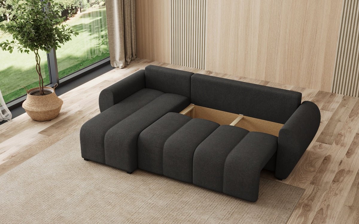 Designer sofa Sorella L with sleeping and folding function in fabric