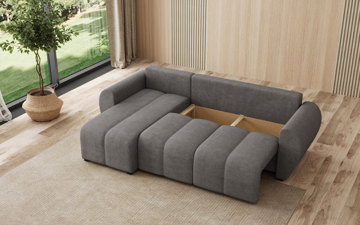 Designer sofa Sorella L with sleeping and folding function in fabric