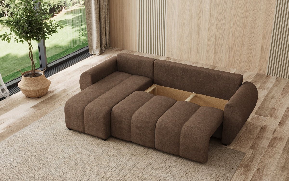 Designer sofa Sorella L with sleeping and folding function in fabric