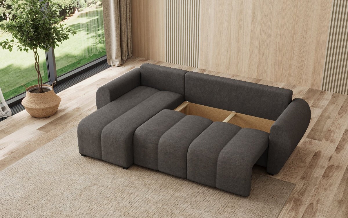 Designer sofa Sorella L with sleeping and folding function in fabric
